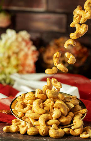 A plate of flying cashewsの写真素材