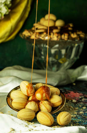 Oriental sweets dish with caramel sauceの写真素材