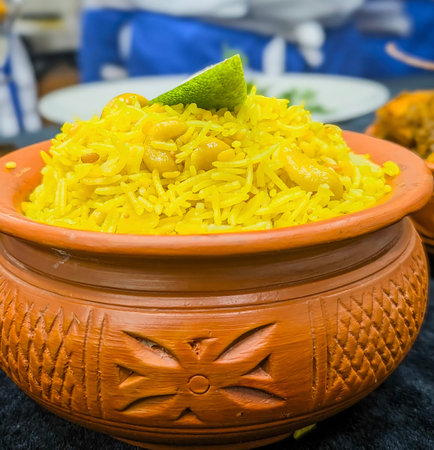 Traditional Indian Basmati Rice with Cashew Nuts in Clay Potの写真素材