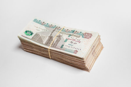 Egyptian money bundles of currency 100 pound isolated on white Backgroundの写真素材