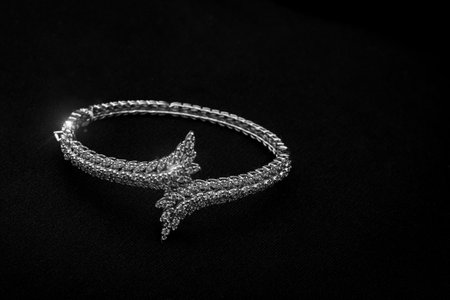 An exquisite white gold necklace adorned with a radiant diamond pendant. This luxurious piece of jewelry embodies elegance and timeless beauty, perfect for both formal and casual wear. A must-have addition to any high-end jewelry collectionの写真素材