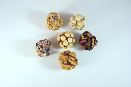 Delight and Cezerye with nuts and raisins on a white backgroundの写真素材