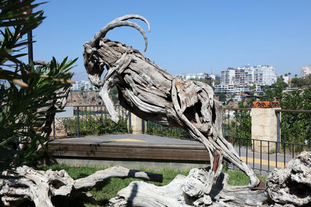 A goat statue made of dried tree trunks and branches. Antalya, Turkey.の写真素材