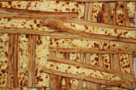 Traditional Konya pastry made with kashar and white cheese. Pastries baked in a wood-fired oven are served with butter on them.の写真素材