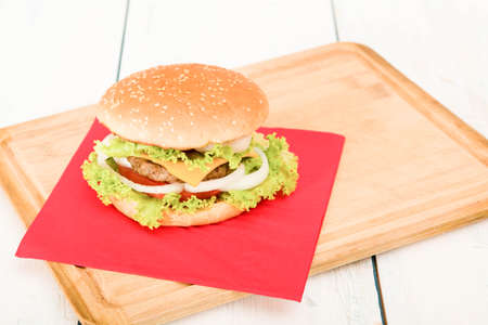 Home made hamburger with onion, tomato, lettuce, cheese . close-upの写真素材