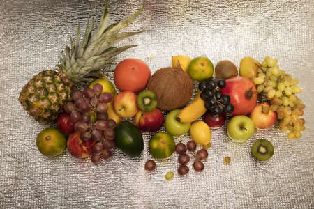 Healthy fruit background ; Studio photo of different fruits on white bright background , high resolution productの写真素材