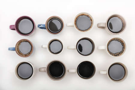 twelve mugs of instant  coffee isolated on white background top viewの写真素材