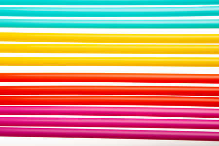 Pile of colorful plastic drinking straws background top view of high quality imageの写真素材