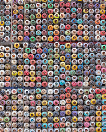 Photo Of  unique colorful weathered  Grungy spray paint cans backgroundの写真素材