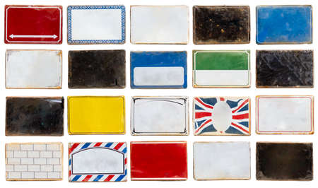 Photo of unique colorful weathered grungy blank street signs isolated on a white background