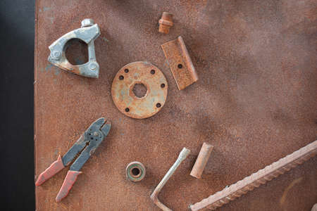 Old, dirty tools against rusty metallic surface  Tool series.mechanic concept , background  conceptの写真素材