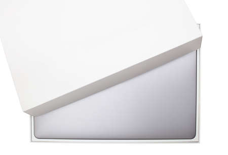 New high-speed thin grey aluminum laptop computer notebook top view with half open box isolated on a...