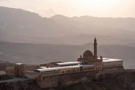 Mosque in the mountains at sunset, Yazd, Iran.の写真素材