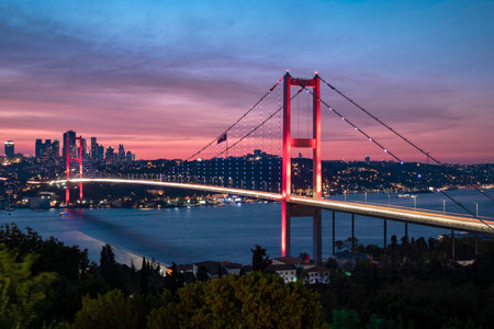 Bosphorus Bridge at sunset in Istanbul, Turkey. The Bosphorus Bridge is one of the most famous...