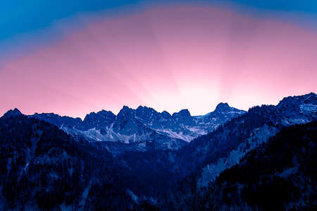 Silhouette of the Allgäu mountains at sunset with gorgeous colorsの写真素材