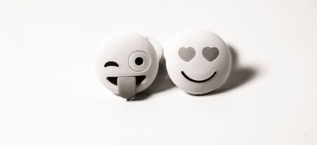 White Emoji With Big Smile And Hearts On White Background.Copy Space for text .