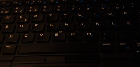 Close up Laptop keyboard at night mode.Concept for technology.の写真素材