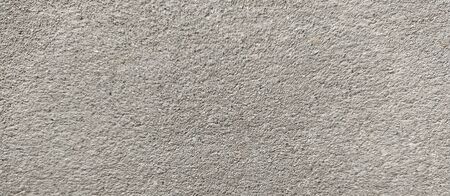 Bright fine-grained sandy texture, natural structure.Facing stone texture.sand fine crumb brown tone texture background.の写真素材