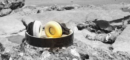 Musical head phone on coral rock selective color with nice background .の写真素材