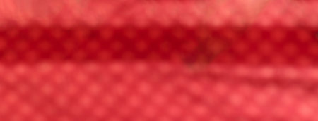 Very unique red color defocused abstract background with pattern.