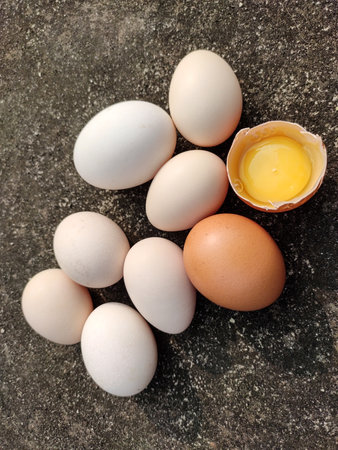 Egg Background.Heap Of Golden And White Eggs On A Texture Background.Verticle Egg Background.