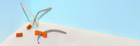 Orange brick on a light background. With a tight shadow