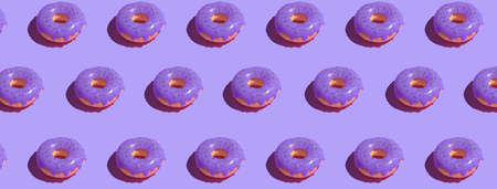 Pink glazed donut pattern on pastel background. Creative concept. 3d.の写真素材