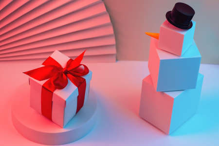 The polygonal snowman of cubes and gift is illuminated with neon light, against the background of...