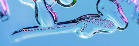 Abstraction on cosmetics, drops, air bubbles, bullets and bottles in neon