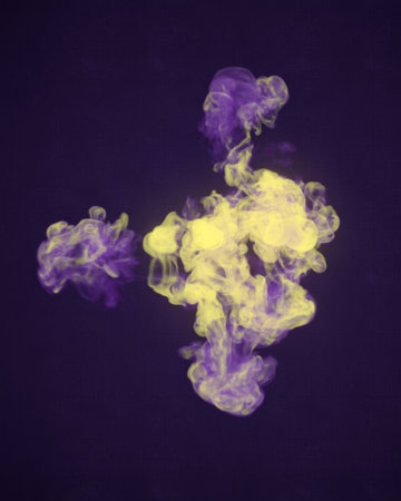 Close up hot yellow and violet colored explosion on old scratched surface. Abstract digital...