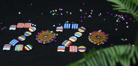 Happy new year 2020 clothing brand colorful buttons Photography. Merry Christmas 2020 sale on tailor shop.の写真素材