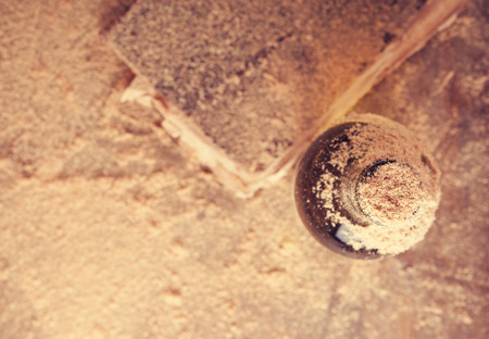 Vintage bottle of wine and a book covered with dustの写真素材