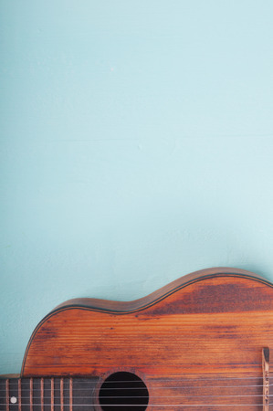 Little guitar on the azure surfaceの写真素材