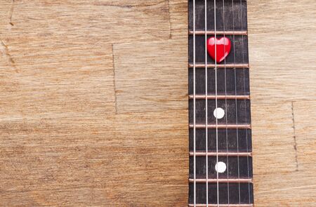 Valentines Day background with hearts on vintage guitarの写真素材