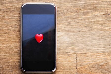 Dating on the Internet, the heart of the phoneの写真素材