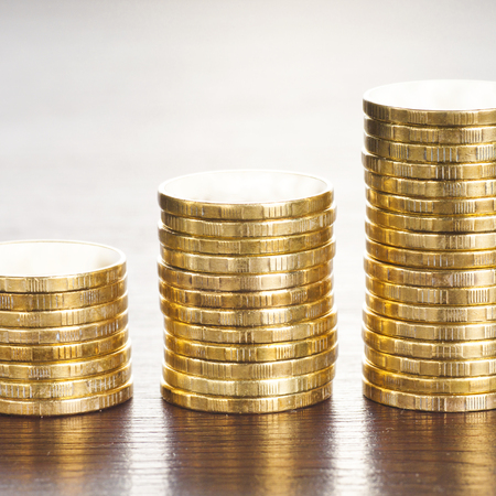three rows of gold stack coins
