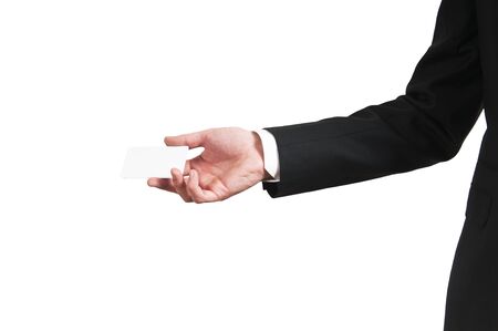 Blank business card in a businessman's handの写真素材