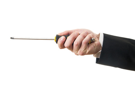 Screwdriver in hand isolated on white backgroundの写真素材