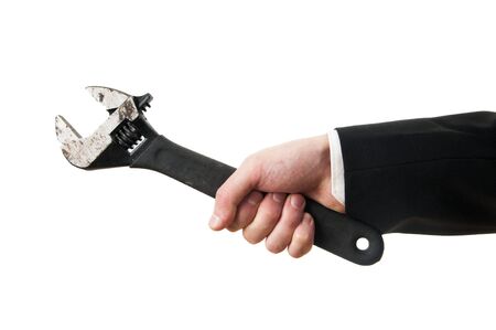 Businessman hand hold spanner tool in hand isolated on whiteの写真素材