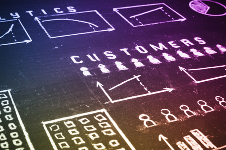 Close up of business strategy flow chart on blackboardの写真素材