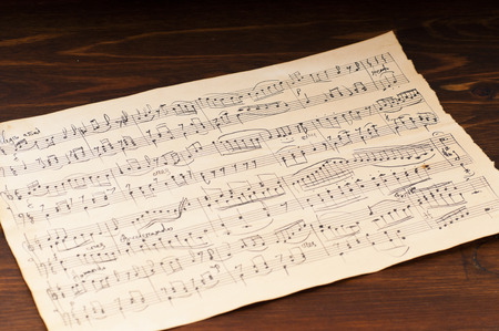 Yellowed from time sheet music notation. Manuscriptの写真素材