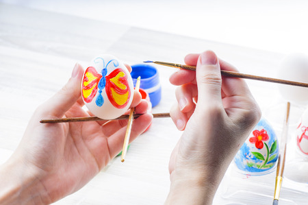 Easter egg painting with acrylic paints
