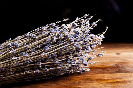 Dry bouquet of lavender on the tableの写真素材