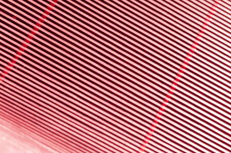 Abstract metallic red background with stripesの写真素材