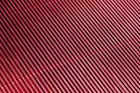 Abstract metallic red background with stripesの写真素材
