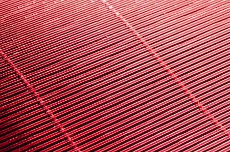 Abstract metallic red background with stripesの写真素材