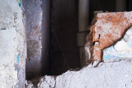 A dirty old hole in the wall, the demolition of the wallsの写真素材