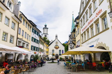 FELDKIRCH, AUSTRIA - SEPTEMBER, 18, 2014: Residential and commercial houses in the medieval part of the European city in the Alpine mountainsのeditorial素材