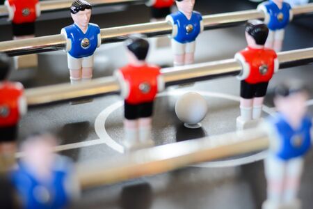 Football table game players suggesting team coachingの写真素材