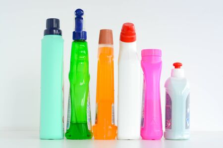 Many bottles of cleaning solutions isolated on white backgroundの写真素材